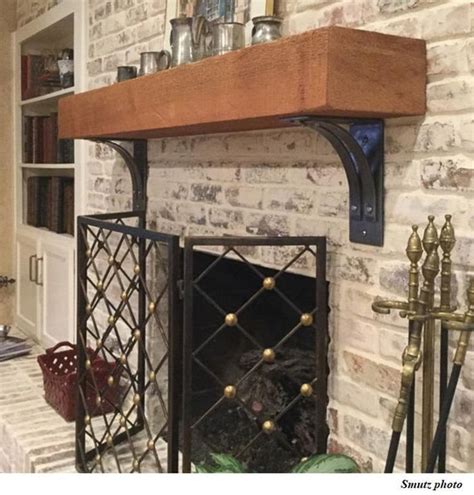 metal mantel bracket|rustic iron brackets for mantels.